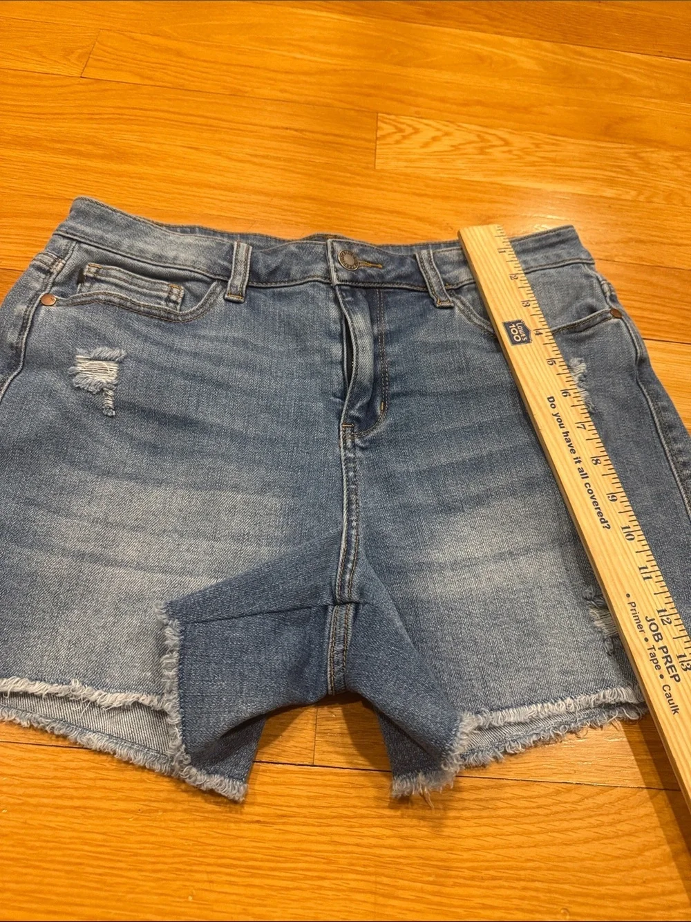 Judy Blue high waisted mild distressed raw hem jeans shorts size large .
